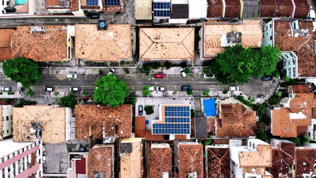 aerial view of rooftop solar panels house
